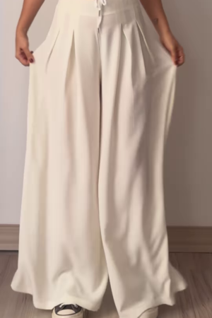 Women’s Beige Wide-Leg Pleated Pants with Drawstring Waist – Flowing Casualwear Styled with White Sneakers