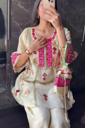 Beige Mirror Work Kurta Set with Pink Accents & Potli Bag