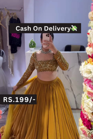 Golden Embroidered Blouse with Mustard Pleated Lehenga  Breezy Festive Style with Floral Mirror Selfie Vibes
